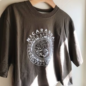 tan nicaragua nike crop tee